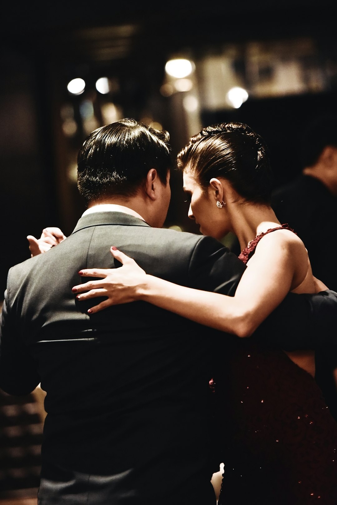 Elegant couple dancing at a formal gala event