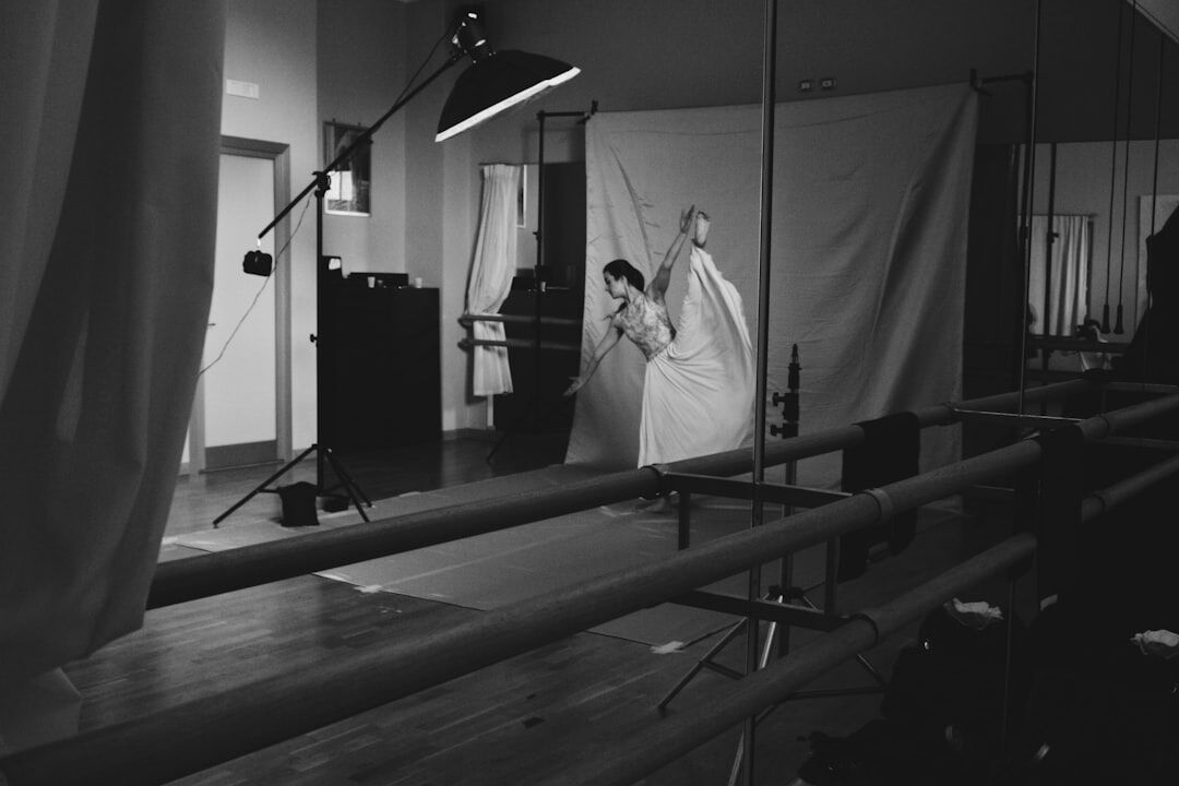 Television crew filming behind the scenes on a studio set