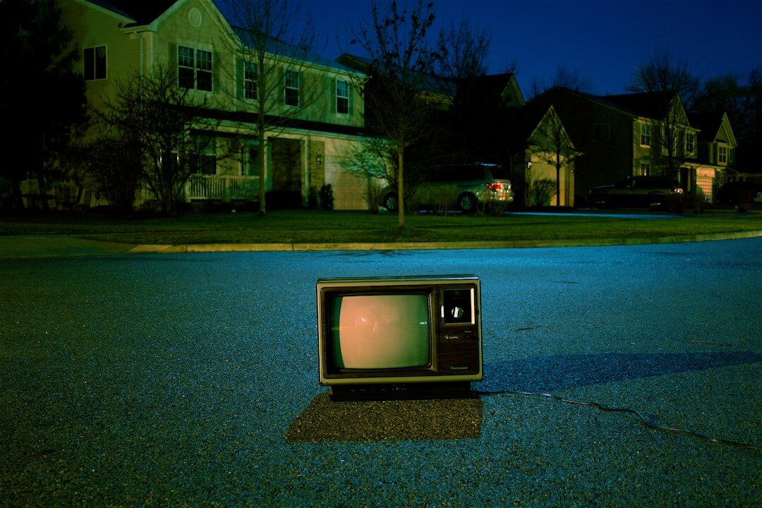 Old television set glowing in a dim living room, retro Uruguayan household